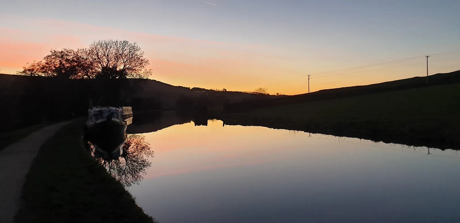 Skipton Castle woods and the Leeds–Liverpool Canal towpath — firm limestone paths out, a flat canal return